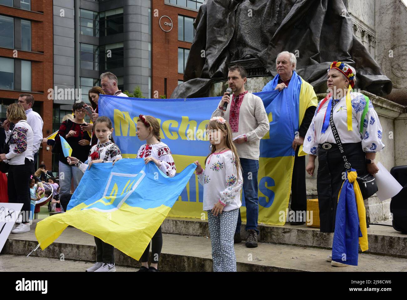 Manchester, UK, 21st May, 2022. “Stand with Ukraine” anti-war rally and embroidered shirt city centre march, a protest about the Russian invasion of Ukraine in Piccadilly Gardens, central Manchester, England, United Kingdom, British Isles. Some protesters wore embroidered shirts in the Ukrainian cultural style. Credit: Terry Waller/Alamy Live News Stock Photo