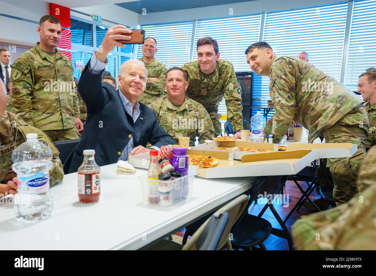 Rzeszow, Poland. 25 March, 2022. U.S President Joe Biden, takes a selfie with members of the U.S. Army 82nd Airborne Division during a visit March 25, 2022 in Rzeszow, Poland.  Credit: Adam Schultz/White House Photo/Alamy Live News Stock Photo