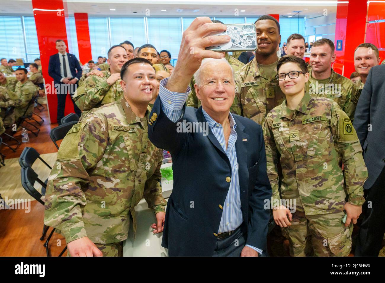 Rzeszow, Poland. 25 March, 2022. U.S President Joe Biden, takes a selfie with members of the U.S. Army 82nd Airborne Division during a visit March 25, 2022 in Rzeszow, Poland.  Credit: Adam Schultz/White House Photo/Alamy Live News Stock Photo