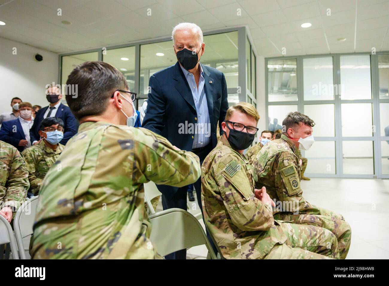Rzeszow, Poland. 25 March, 2022. U.S President Joe Biden, greets members of the U.S. Army 82nd Airborne Division during a stop at the Barber Shop at the G2A arena, March 25, 2022 in Jasionka, Poland.  Credit: Adam Schultz/White House Photo/Alamy Live News Stock Photo