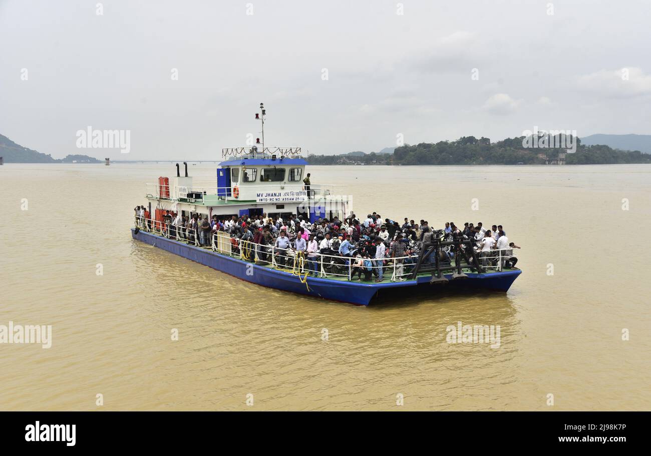 Guwahati, Guwahati, India. 20th May, 2022. People travel in a ship from