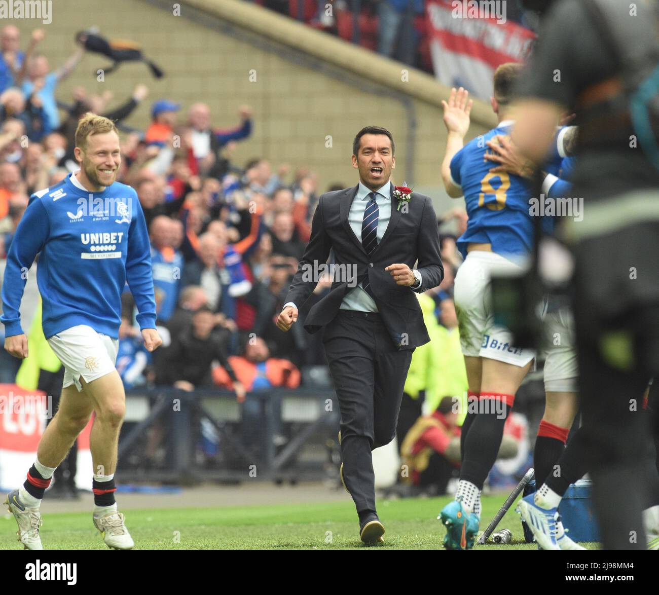 Hampden Park.Glasgow.Scotland, UK. 21st May, 2022. Rangers vs Heart of Midlothian. Scottish Cup Final 2022 Giovanni van Bronckhorst, manager of Rangers FC runs in to join the celebrations after 2nd Goal vs Hearts. Credit: eric mccowat/Alamy Live News Stock Photo