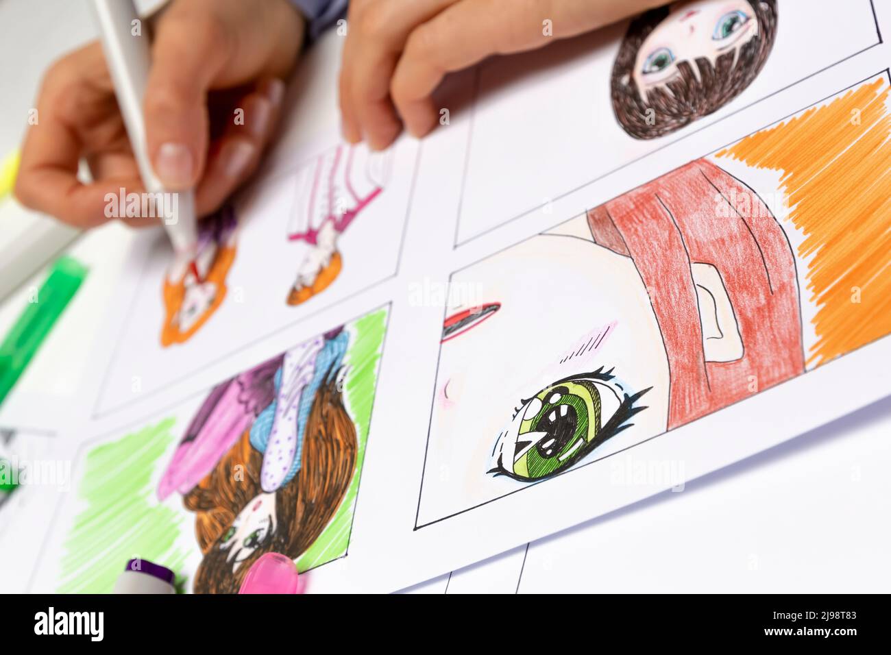 The Artist Draws Anime Comics On Paper Storyboard For The Cartoon The  Illustrator Creates Sketches For The Book Stock Photo - Download Image Now  - iStock