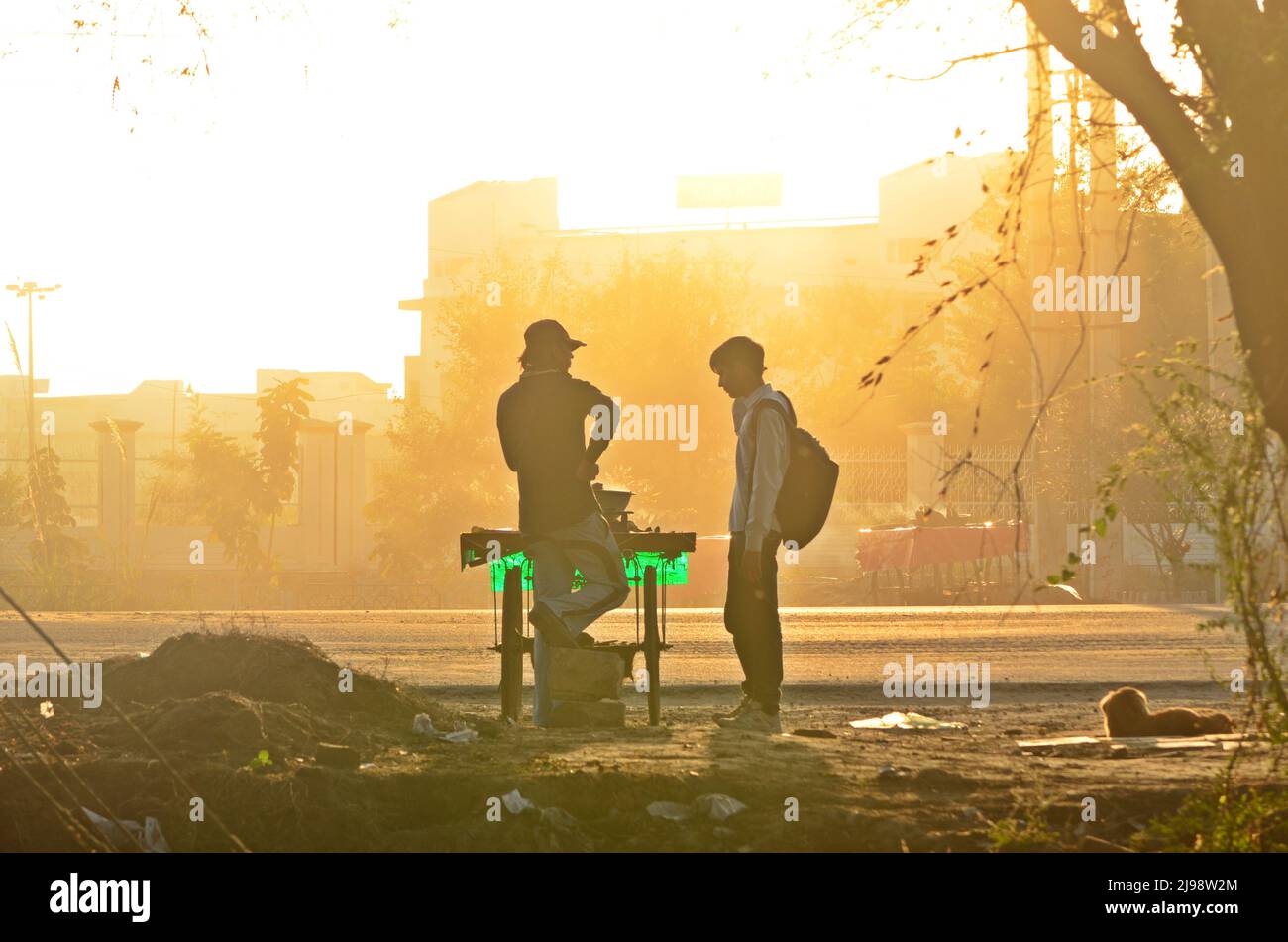 Silhouette of a street vendor Stock Photo