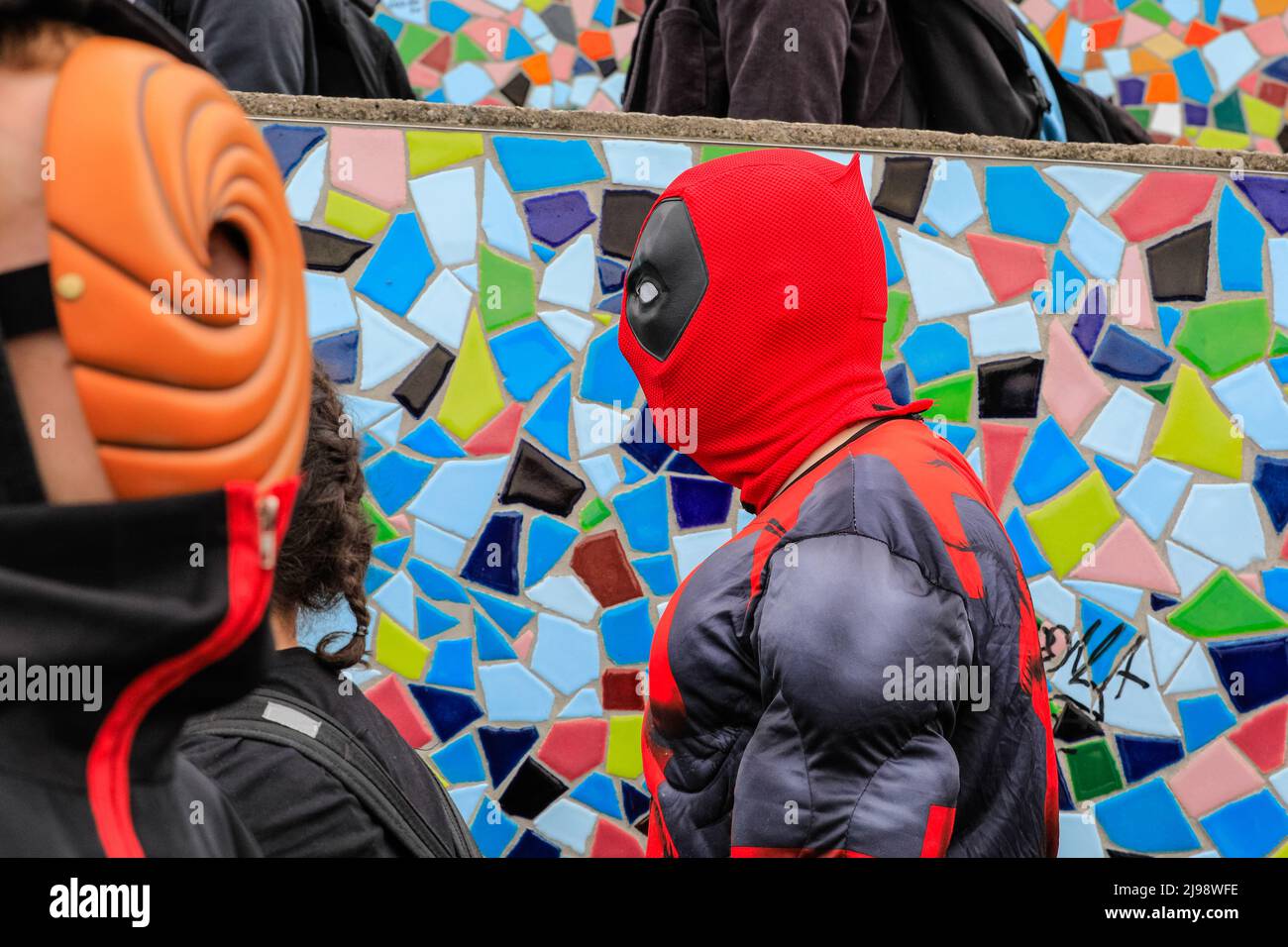 Düsseldorf, NRW, Germany. 21st May, 2022. Spiderman goes incognito. Tens of thousands of visitors and cosplayers enjoy the warm sunshine along the river Rhine embankment in their outfits inspired by Japanese anime, video and games. Stage performances, cosplay, stalls and demonstrations of Japanese culture, sports and traditions are featured at Düsseldorf's annual Japan Day, celebrating Japan and the Japanese community in the city. Düsseldorf is home to the largest Japanese community in Germany. Credit: Imageplotter/Alamy Live News Stock Photo
