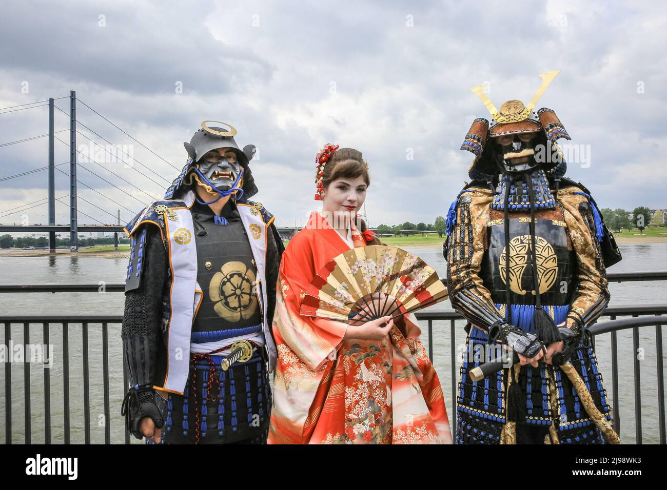 Düsseldorf, NRW, Germany. 21st May, 2022. Tens of thousands of visitors and cosplayers enjoy the warm sunshine along the river Rhine embankment in their outfits inspired by Japanese anime, video and games. Stage performances, cosplay, stalls and demonstrations of Japanese culture, sports and traditions are featured at Düsseldorf's annual Japan Day, celebrating Japan and the Japanese community in the city. Düsseldorf is home to the largest Japanese community in Germany. Credit: Imageplotter/Alamy Live News Stock Photo