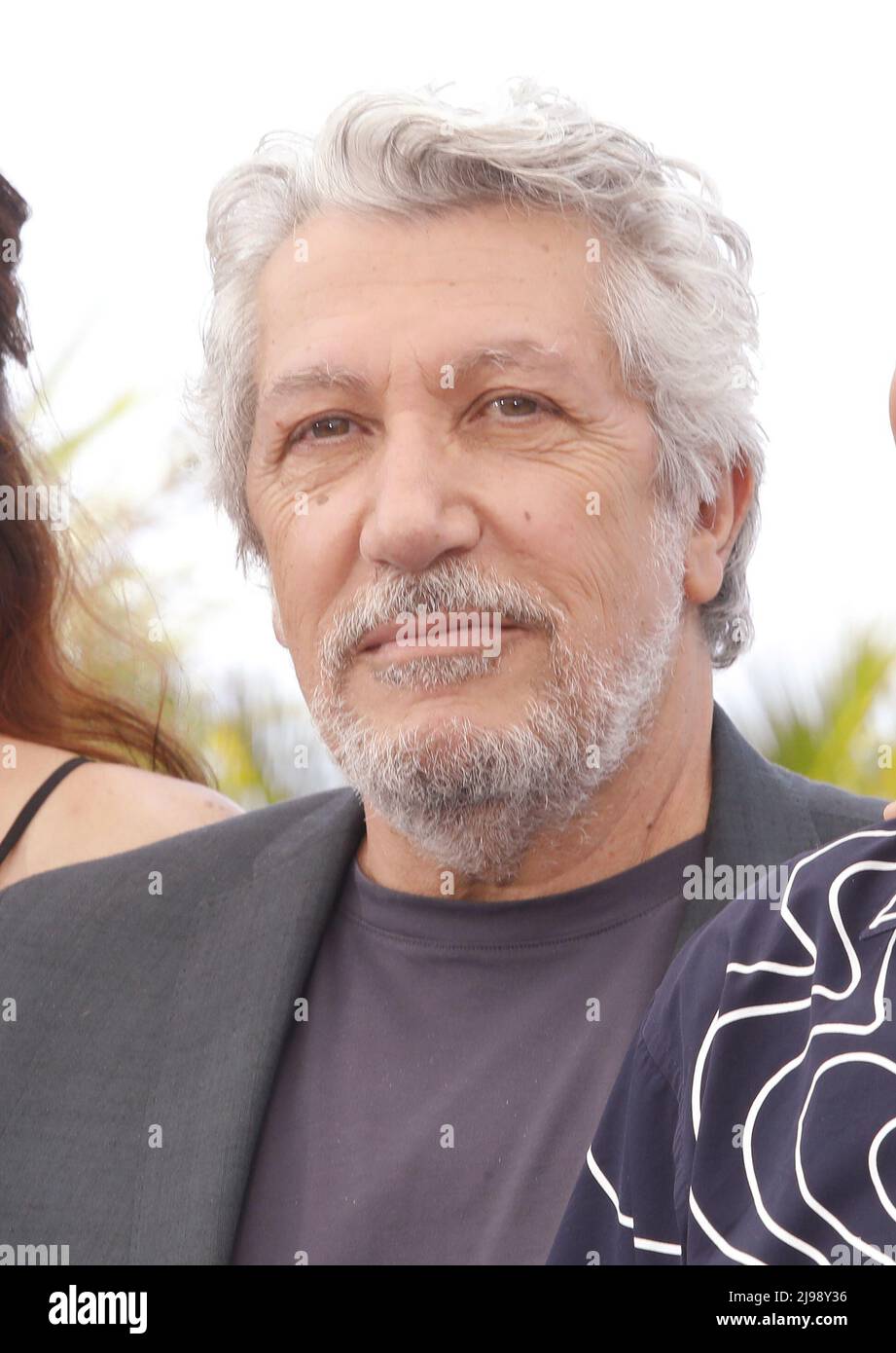 Cannes, France. 21st May, 2022. Alain Chabat attends the photocall for "Smoking Causes Coughing