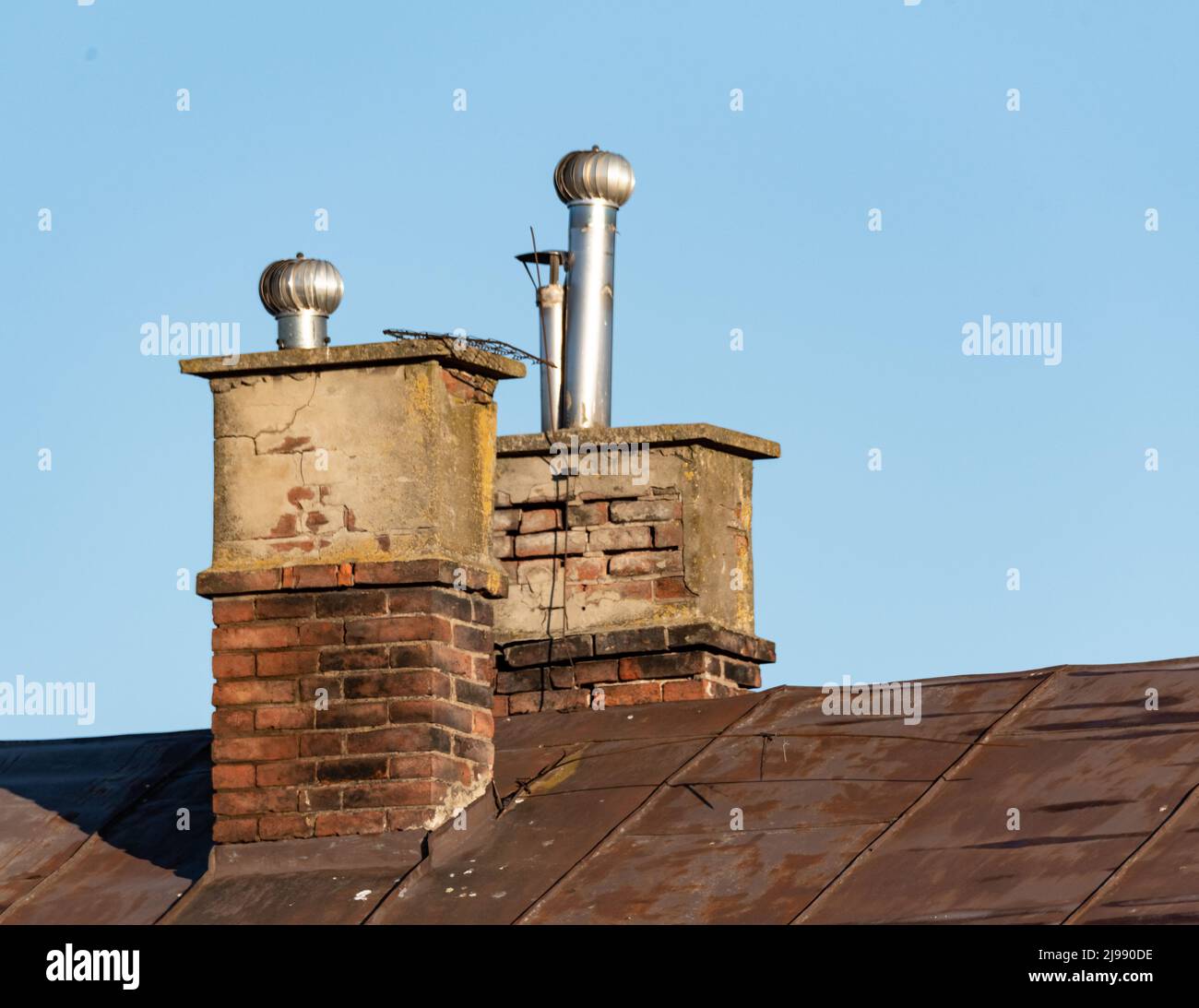 Chimney on the roof of the building. Vent and smoke chimney, smoke