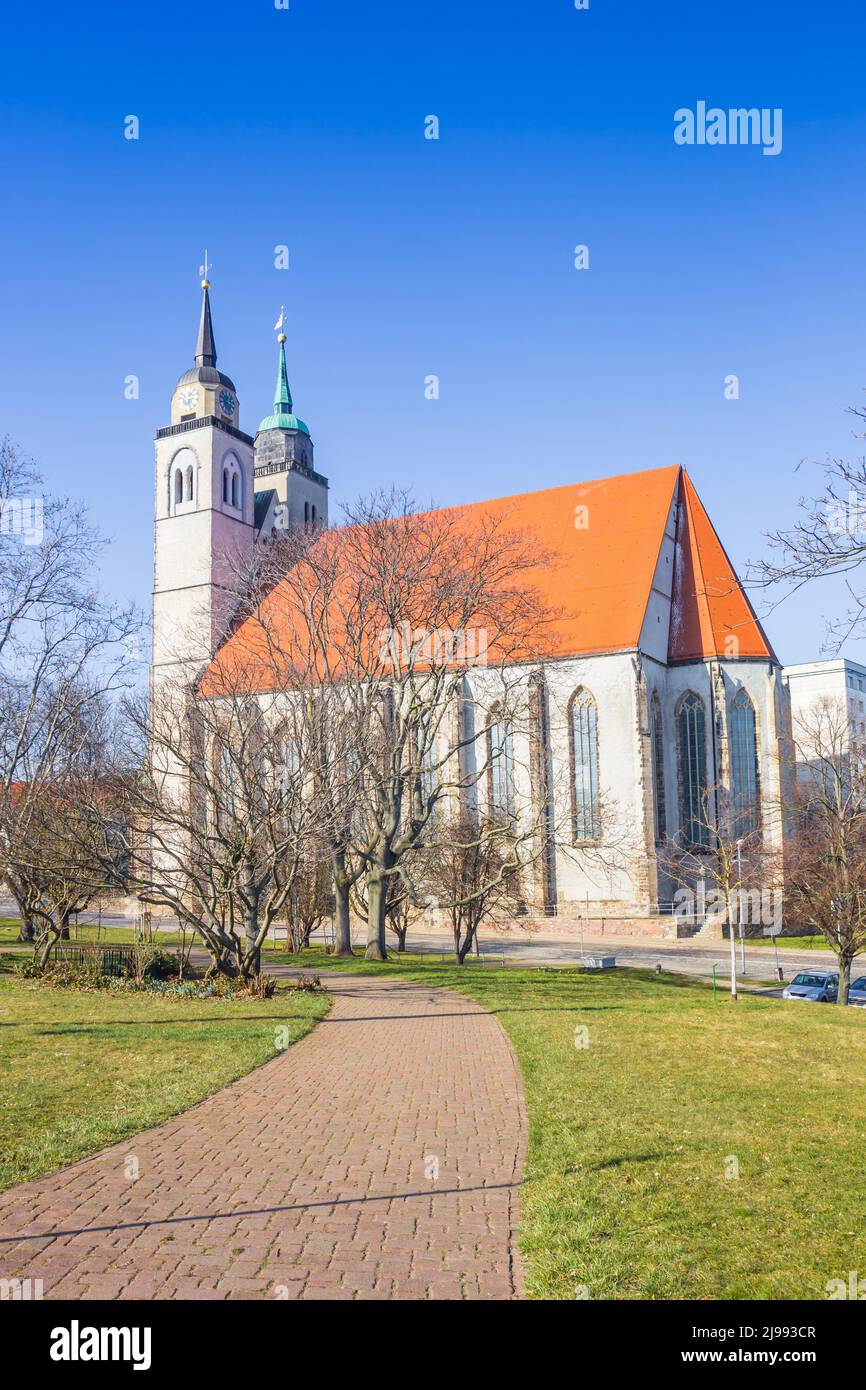 Path leading to the historic Johannis church in Magdeburg, Germany Stock Photo