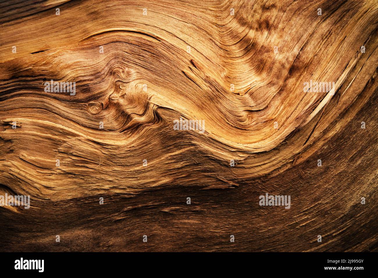 nature background abstract detail of a wavy split wood Stock Photo - Alamy