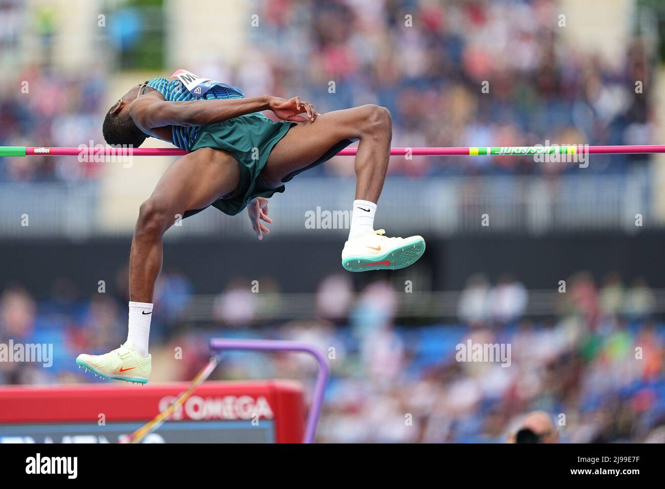 Shelby McEwen of USA jumps for the bar in the men’s high jump during