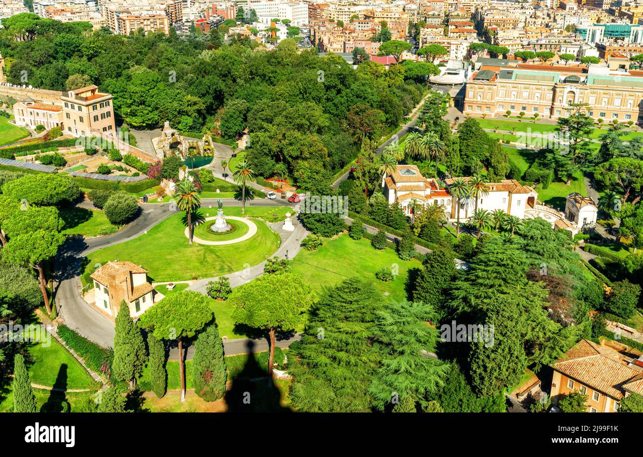 Vatican Gardens in Rome, Italy. Scenic aerial view of Vatican City from St Peter Basilica. Nice landscape of Rome in summer, scenery of old houses and Stock Photo