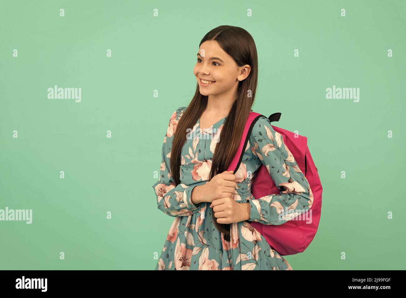 smiling teen girl carry backpack going to school, school time Stock ...