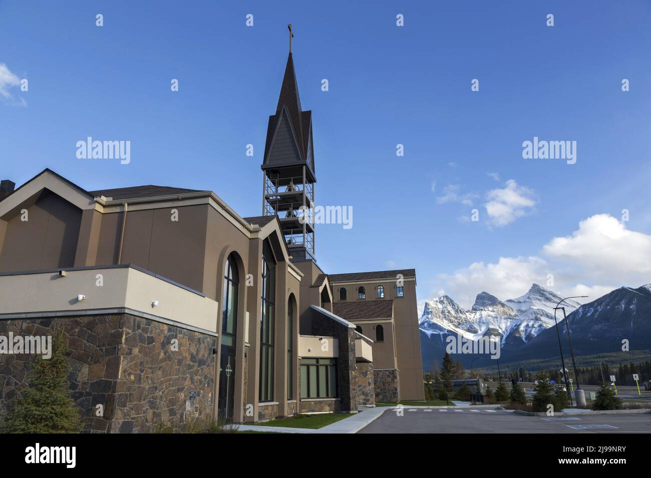 The Shrine Church of Our Lady of The Rockies.  Modern Roman Catholic Church Building Exterior in City of Canmore, Alberta Canadian Rocky Mountains Stock Photo