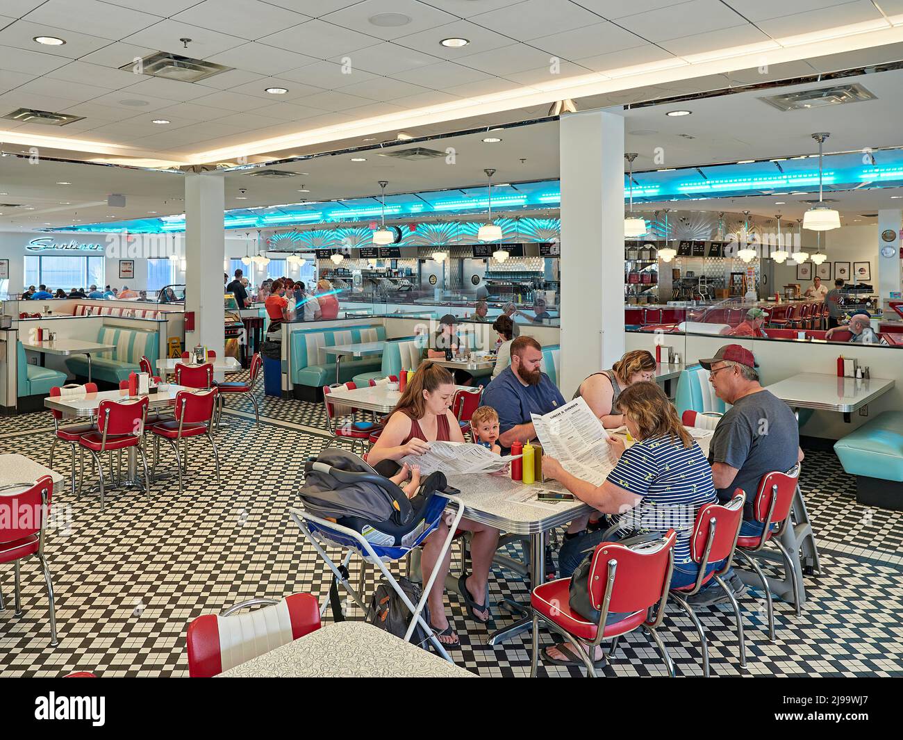 Restaurant with family diners enjoying lunch or dinner while at the Sunliner Diner in Sevierville Tennessee, USA. Stock Photo