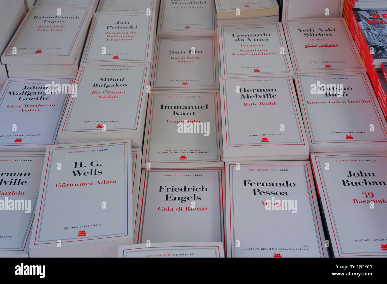 Books in Turkish displayed on table for sale at a book fair Stock Photo