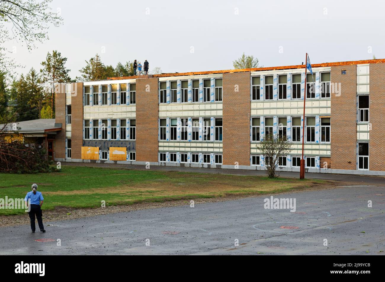 High winds late Saturday afternoon tear the roof off an elementary school under renovation in Saint- Alphonse-Rodriquez,  Quebec Stock Photo