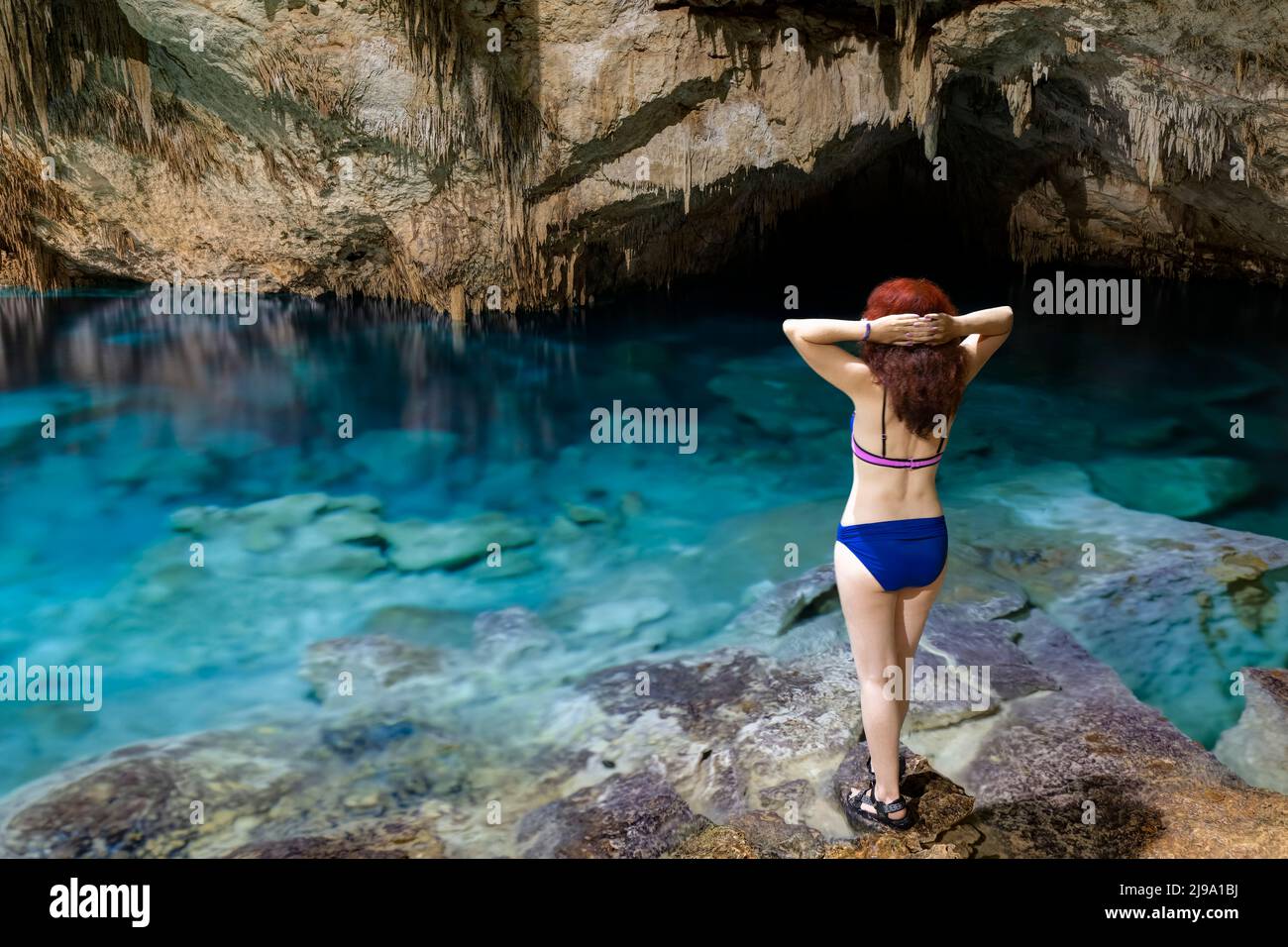 Woman in Taak Bi Ha Cenote, Riviera Maya, Playa del Carmen, Mexico Stock Photo