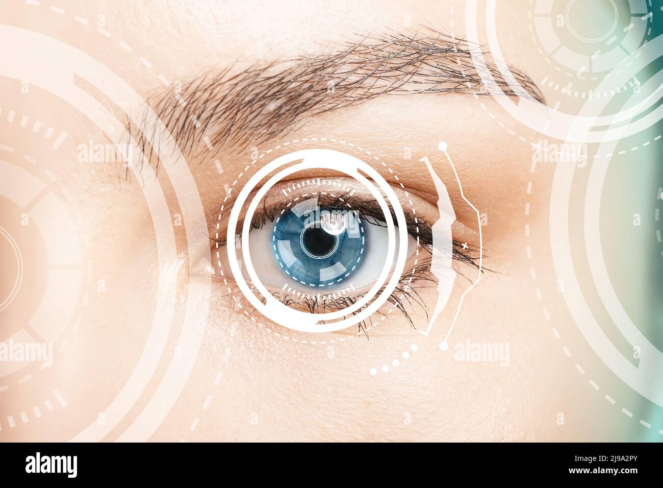 Young woman with iris scanning, closeup view Stock Photo