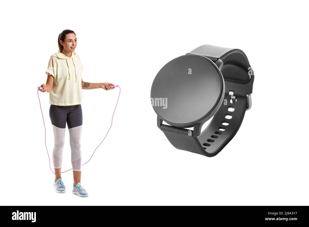 Smartwatch Rope Sporty young woman with jumping rope and big smartwatch with blank ...