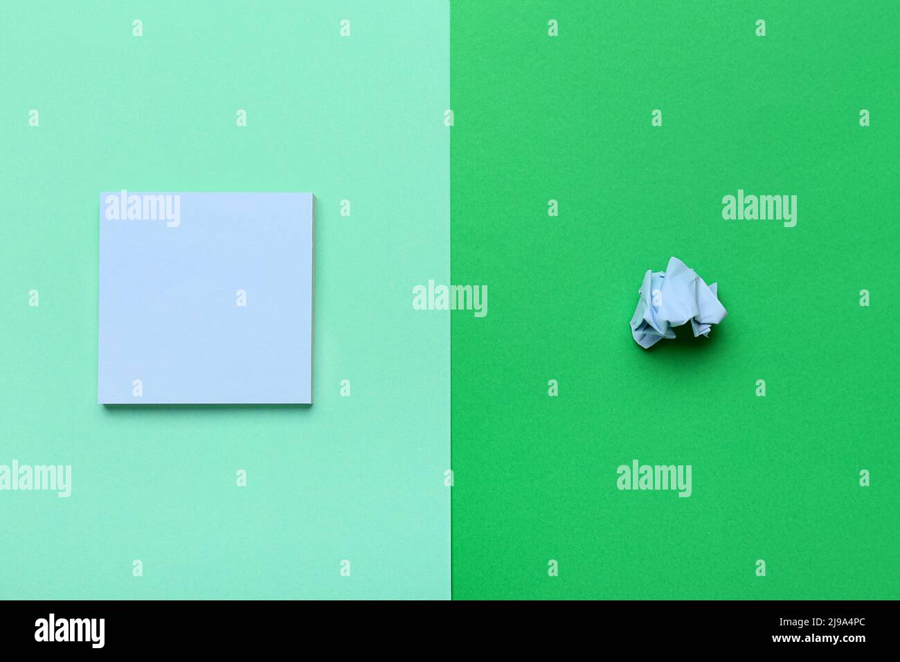 Blank sticky note and crumpled paper on color background Stock Photo ...