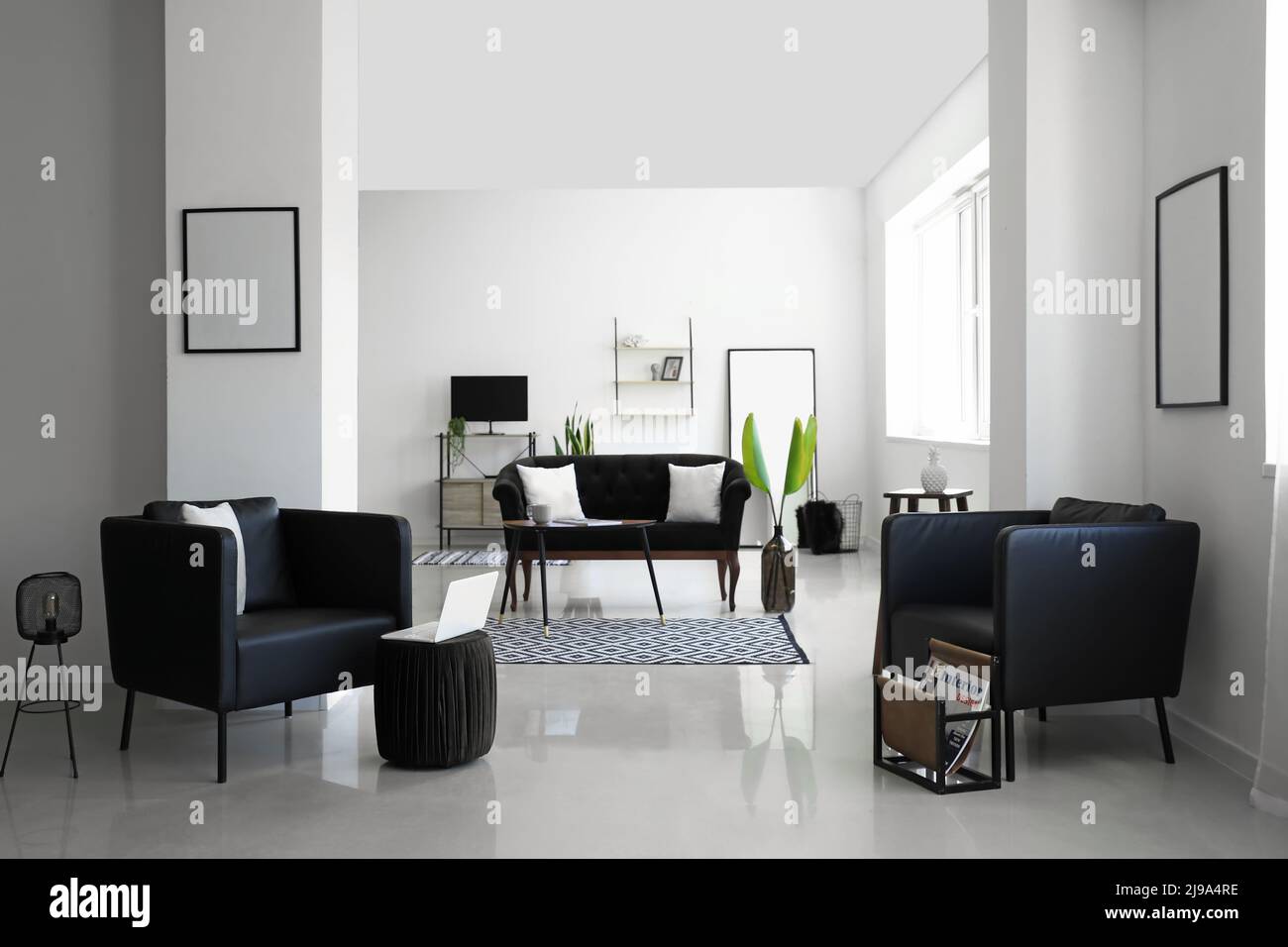 Modern living room interior with stylish sofa and armchairs Stock Photo ...