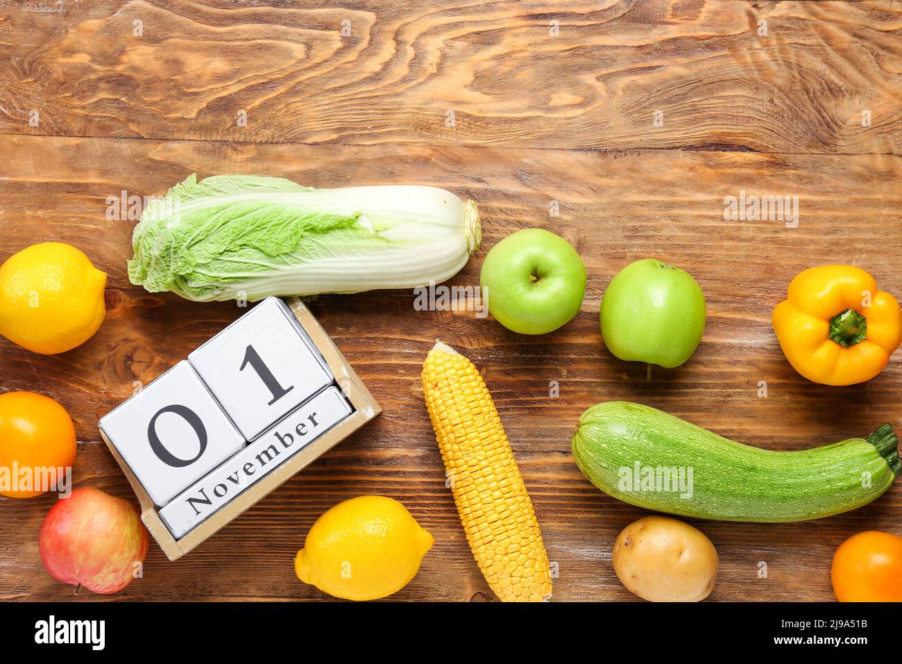 Cube calendar with date NOVEMBER 1, delicious fruits and vegetables on