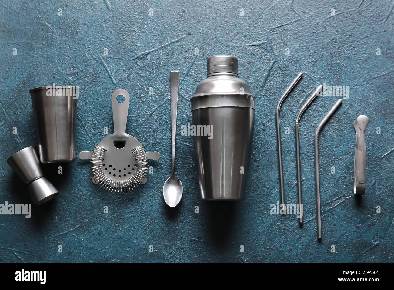 Different bartender tools on dark background Stock Photo - Alamy