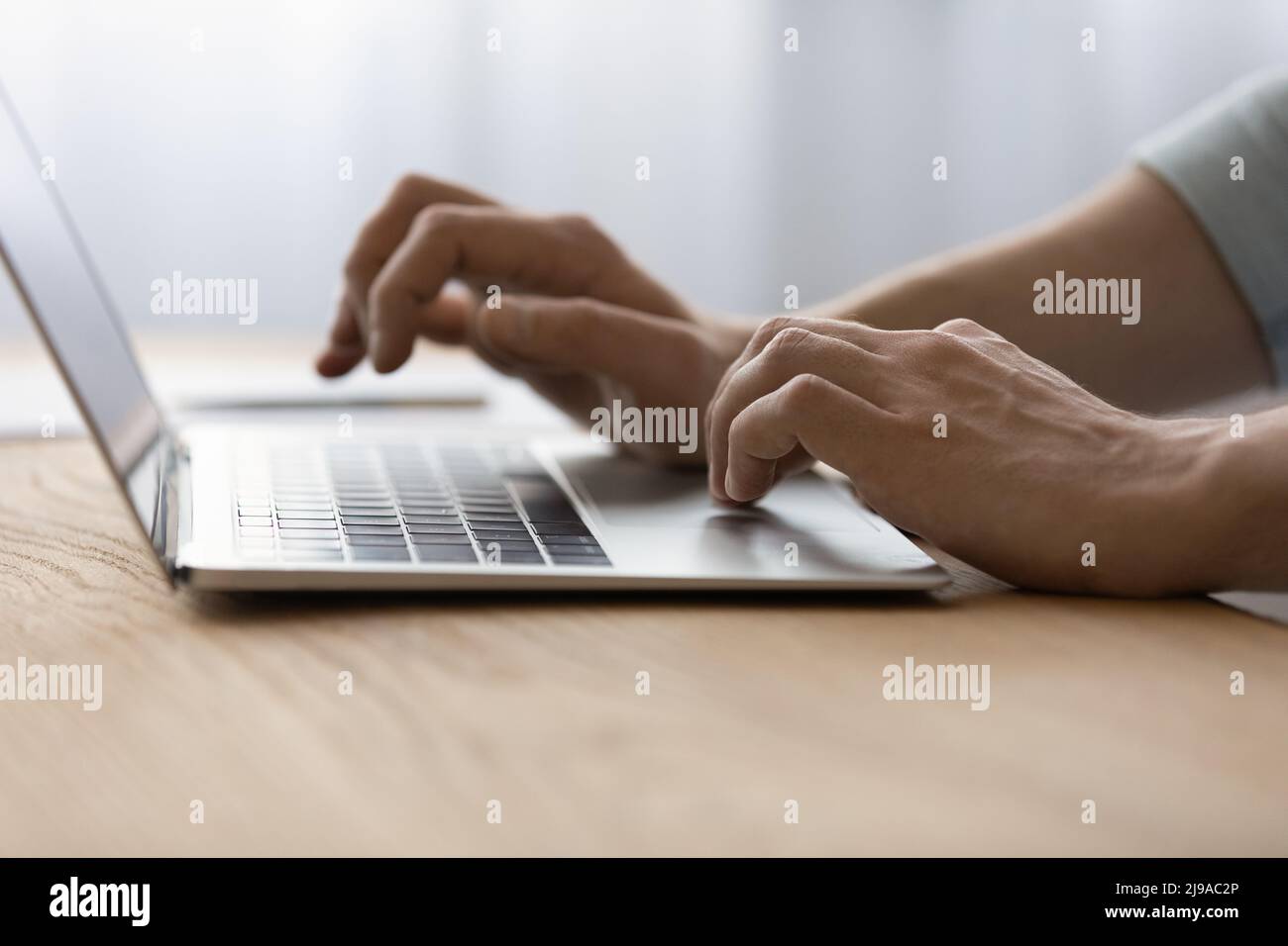 Closeup young man hands typing hi-res stock photography and images - Alamy