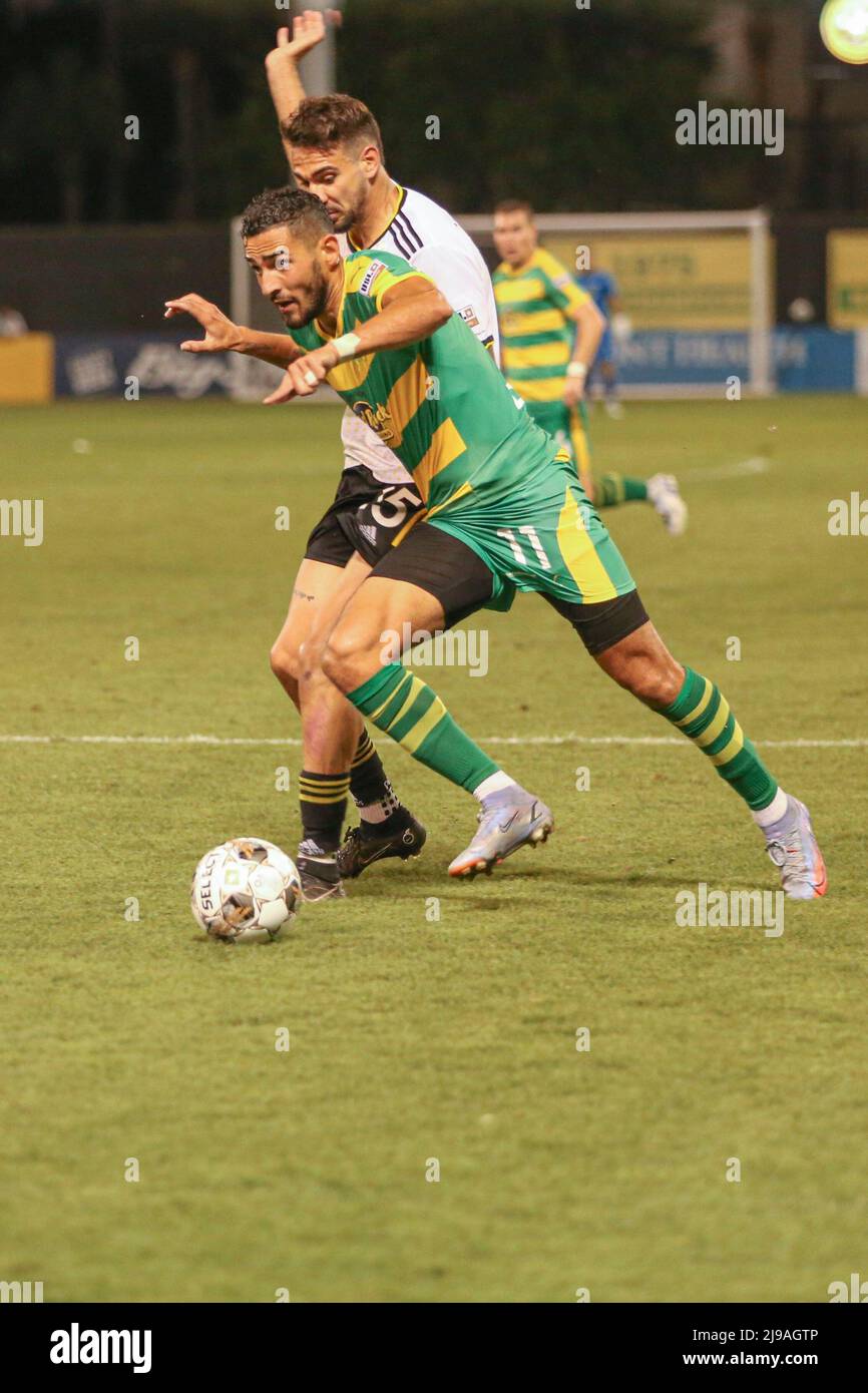 St. Petersburg, FL: Pittsburgh Riverhounds SC defender Arturo Ordóñez (15) attempts to steal the ball from Tampa Bay Rowdies midfielder Leo Fernandes Stock Photo