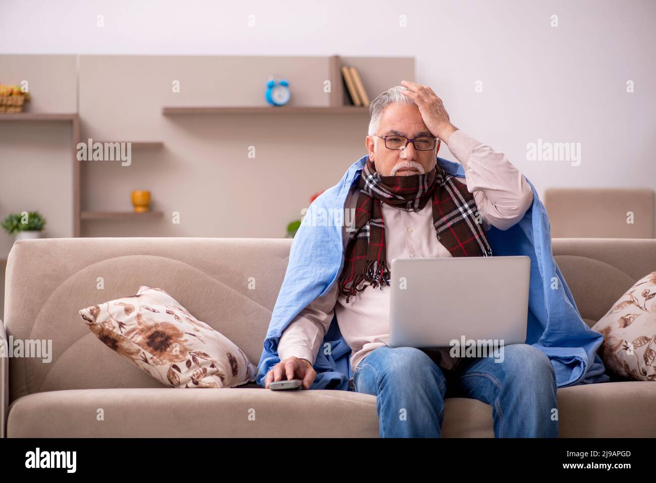 Sick old man coughing sitting hi-res stock photography and images - Alamy