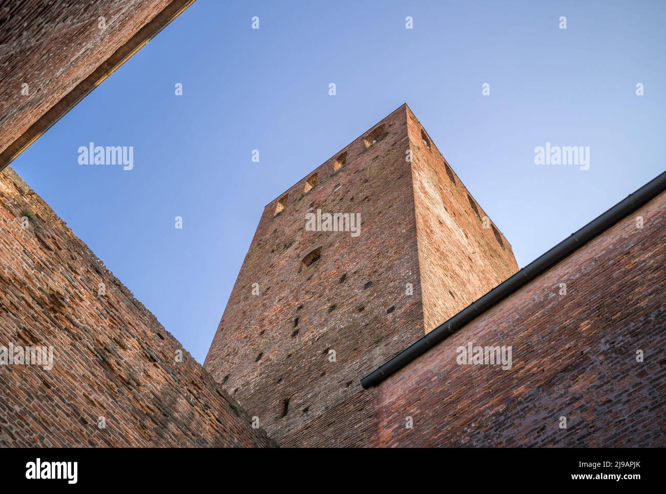 Montagnana, Italy - March 4, 2022: Upward view of the St.Zeno castle with the Ezzelino tower, part of the medieval walls that surround the town Stock Photo
