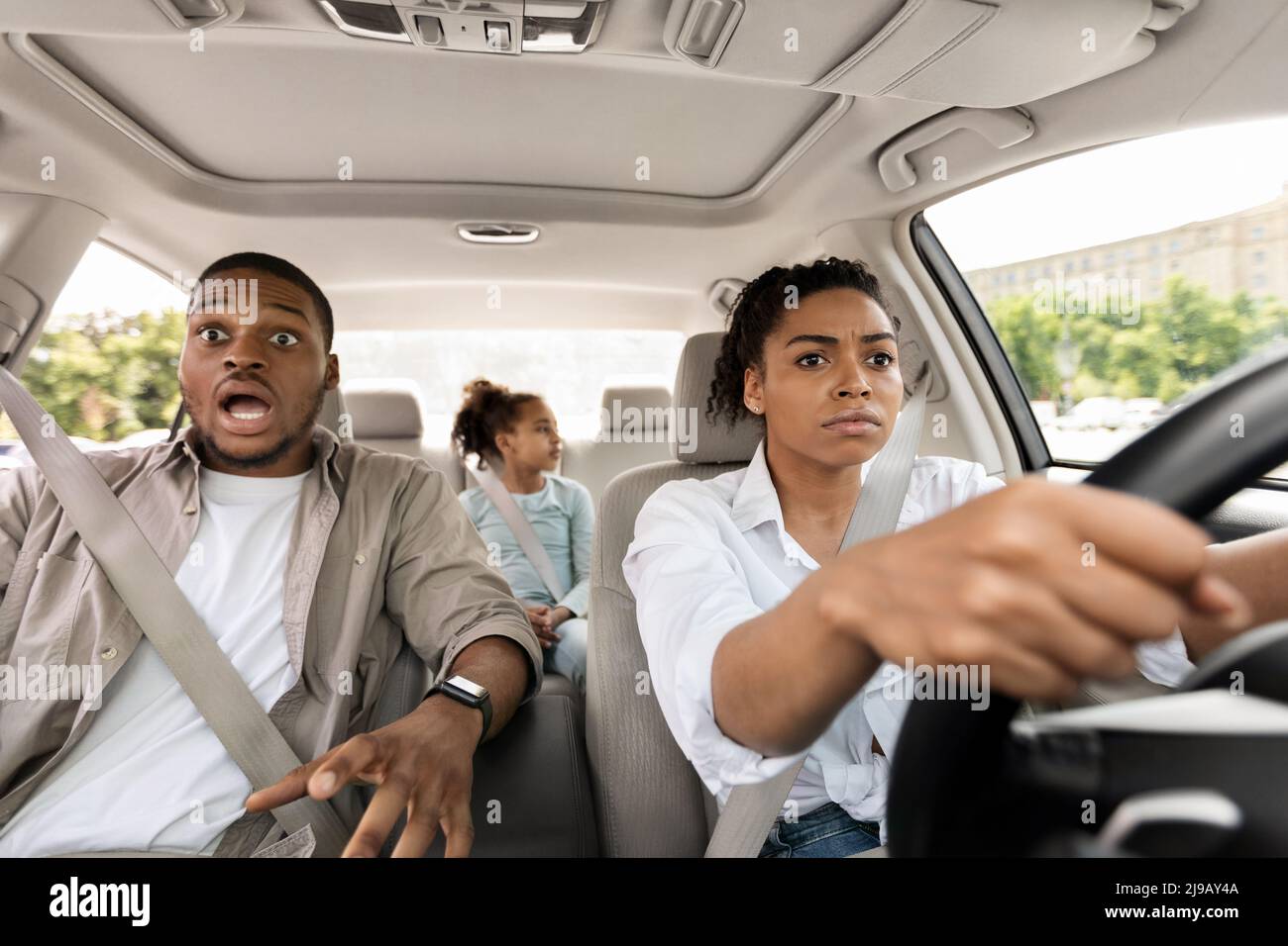 Black Family Riding Auto Having Danger Of Car Accident Stock Photo