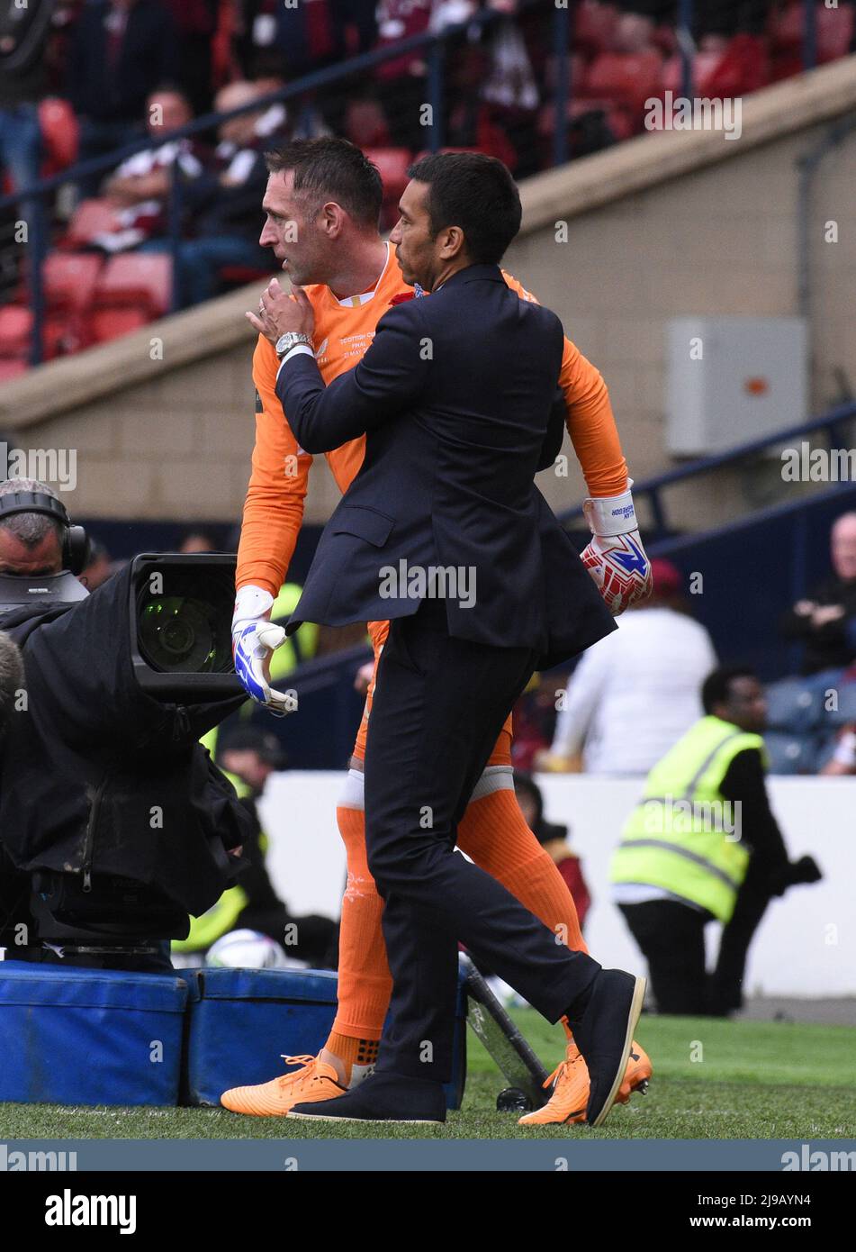 Hampden Park.Glasgow.Scotland, UK. 21st May, 2022. Rangers vs Heart of Midlothian. Scottish Cup Final 2022 Rangers vs Hearts. Allan McGregor (#1) of Rangers FC gets a hug from Giovanni van Bronckhorst, manager of Rangers FC before coming on for the last few minutes Credit: eric mccowat/Alamy Live News Stock Photo