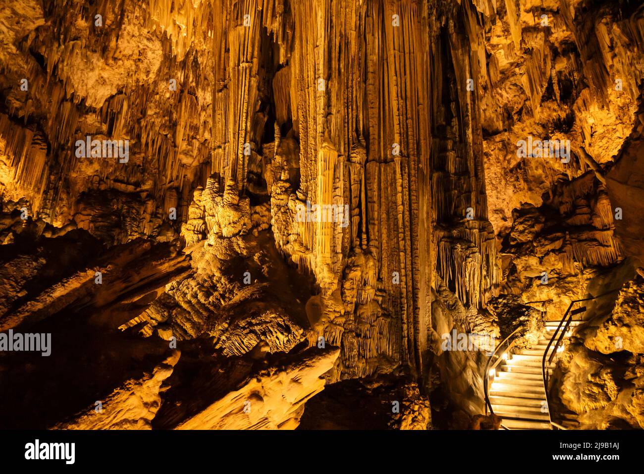 Mighty stalactites and stalagmite form the impressive scenery of the 'Cueva de Nerja” dripstone cave, near Málaga, Andalusia, Spain Stock Photo