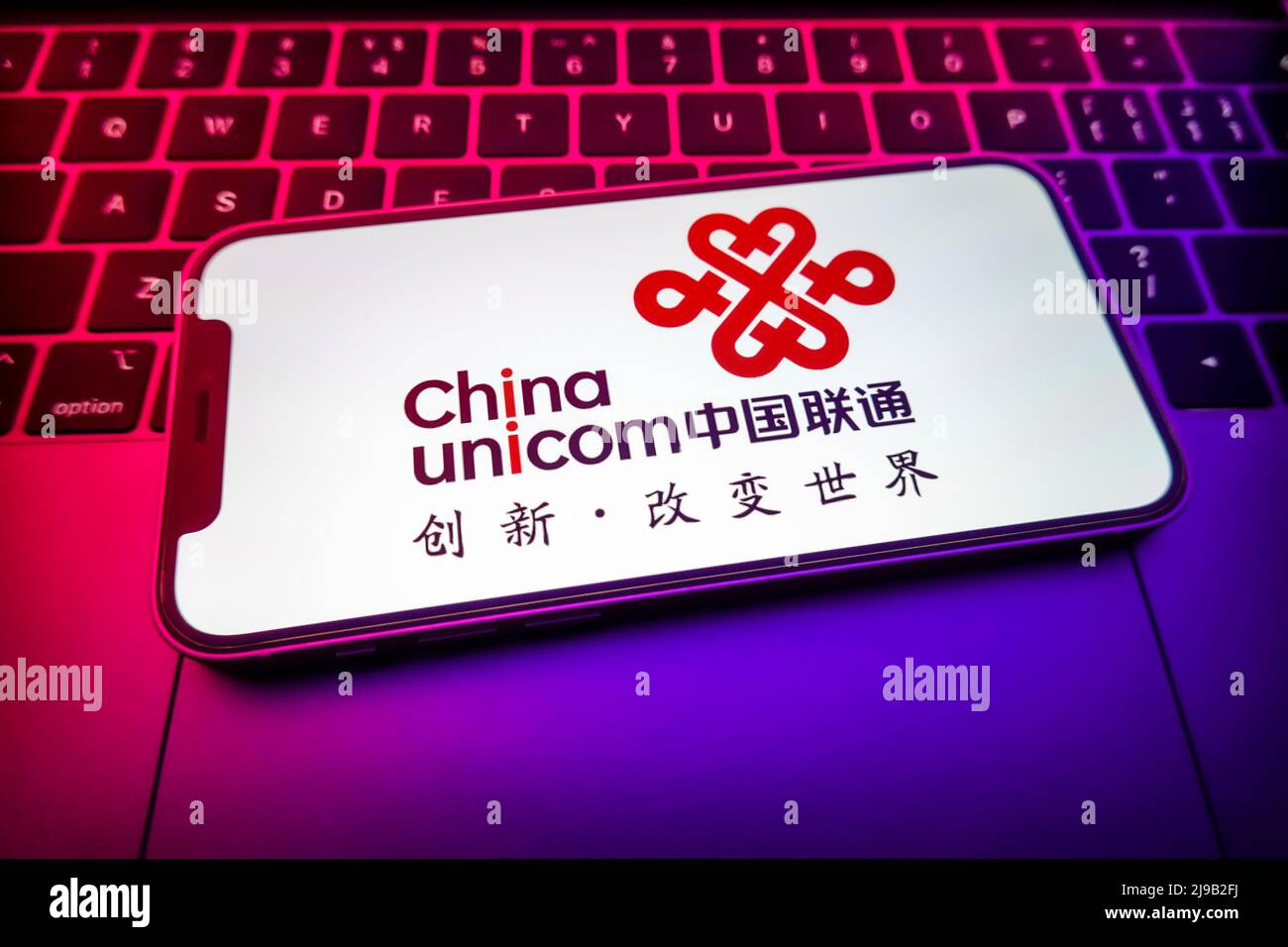 In this photo illustration, a China Unicom logo is displayed on the screen of a smartphone. (Photo by Sheldon Cooper / SOPA Images/Sipa USA) Stock Photo