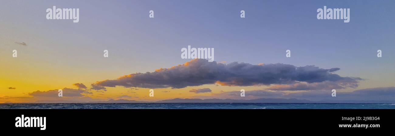 Blue cloud clouded sky hi-res stock photography and images - Alamy