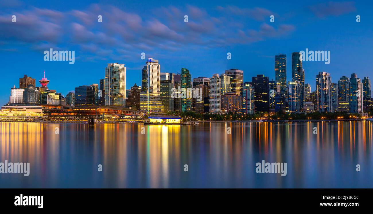 Night skyline of Vancouver downtown from Stanley Park Stock Photo