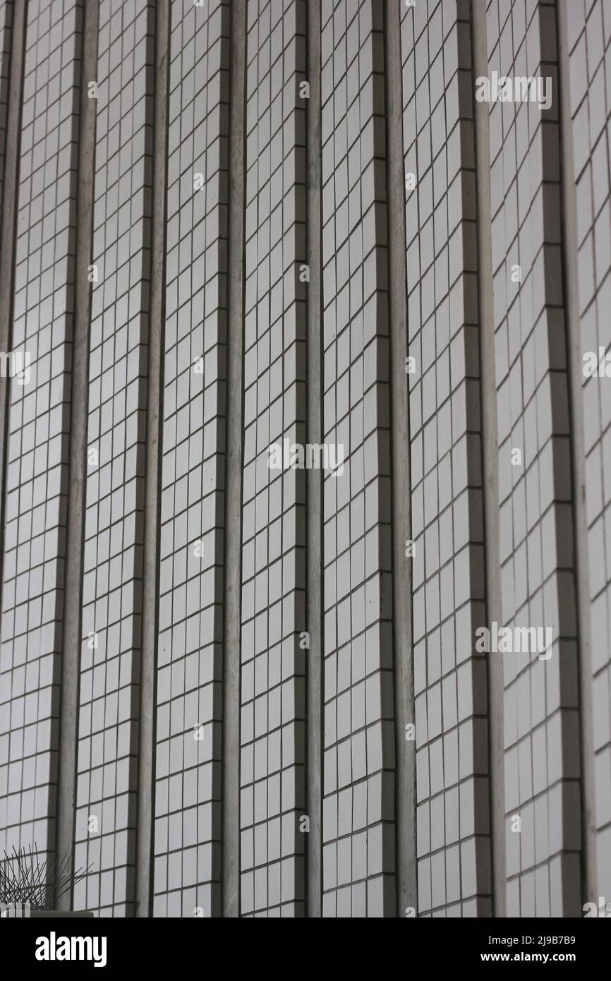 Square tiles on a wall in a grid repeat pattern stock photo alamy