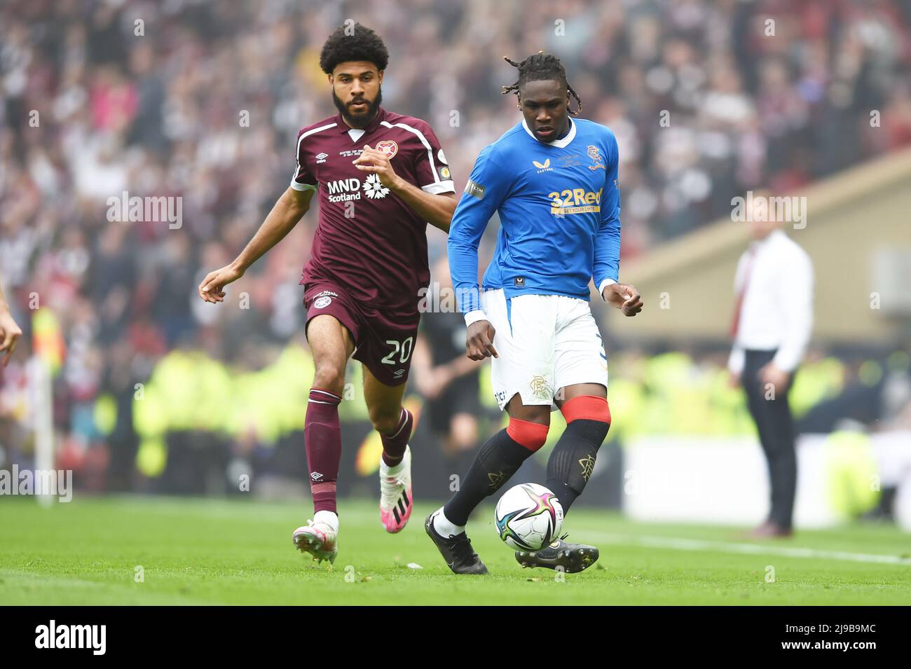 Glasgow, Scotland, 21st May 2022.  Ellis Simms of Hearts and Calvin Bassey of Rangers during the Scottish Cup match at Hampden Park, Glasgow. Picture credit should read: Neil Hanna / Sportimage Stock Photo