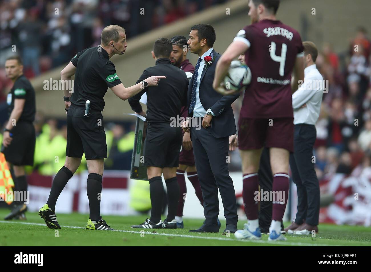 Glasgow, Scotland, 21st May 2022.  Referee William Collum with Rangers Manager Giovanni van Bronckhorst during the Scottish Cup match at Hampden Park, Glasgow. Picture credit should read: Neil Hanna / Sportimage Stock Photo
