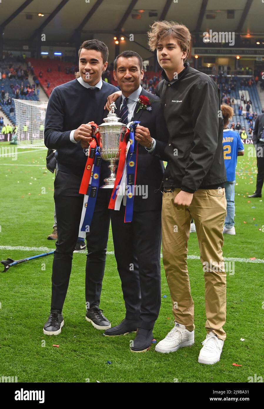 Glasgow, Scotland, 21st May 2022.  Rangers Manager Giovanni van Bronckhorst with his two sons after  his team won the Scottish Cup match at Hampden Park, Glasgow. Picture credit should read: Neil Hanna / Sportimage Stock Photo