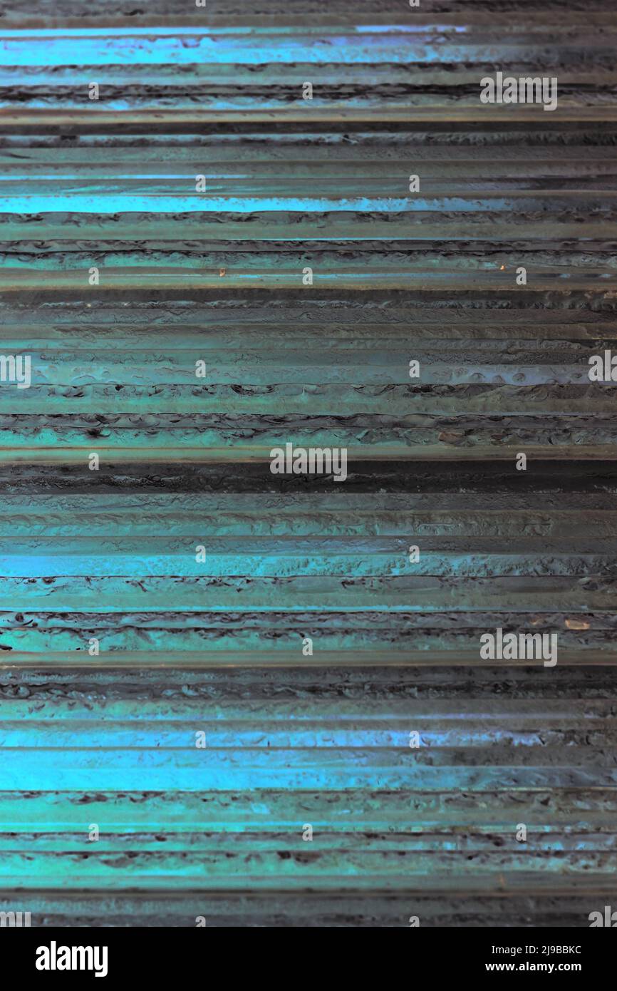 Layers of glass set upon one another as a stack of horizontal plates