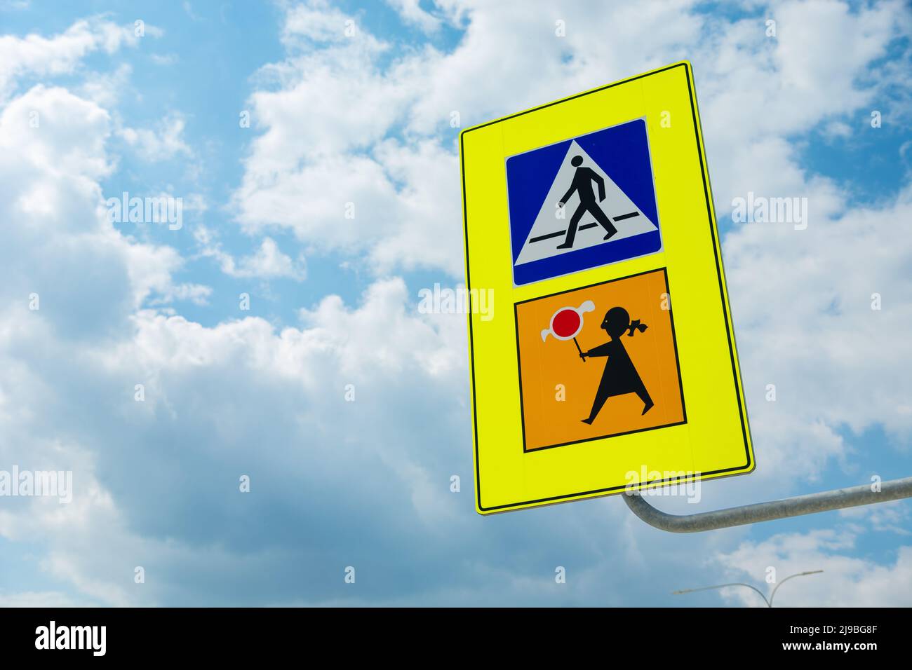 Traffic sign pedestrian crossing and attention to children, close up Stock Photo