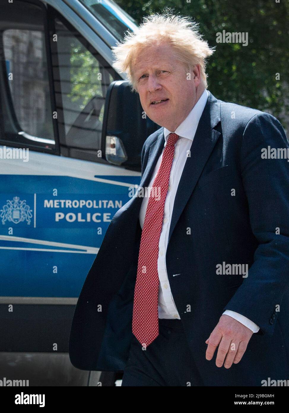 London - 19/05/2022.UK Prime minister Boris Johnson is seen walking past a Metropolitan Police Van, from the Tory Party Head Quarters back to Downing Stock Photo