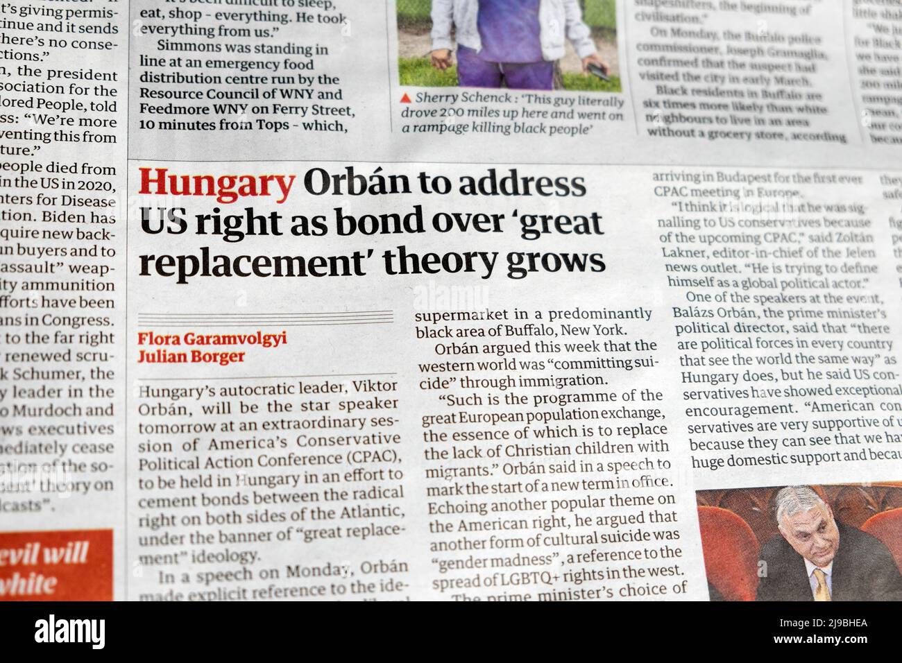 'Hungary Orbán to address US right as bond over 'great replacement' theory grows' Guardian newspaper headline clipping 18 May 2022 London UK Stock Photo