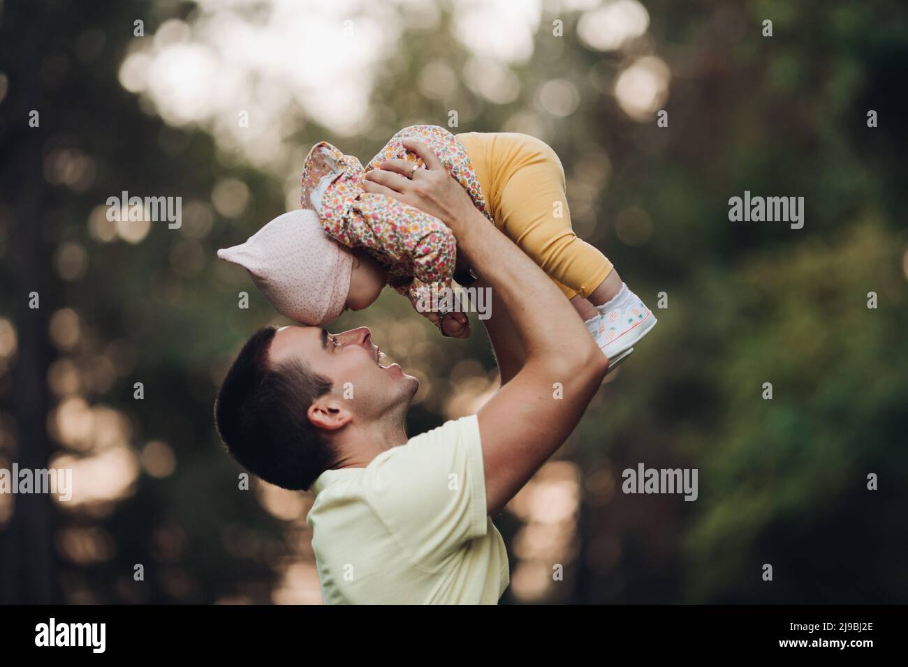 Father and daughter walking in the park in autumn, portrait. Dad and ...