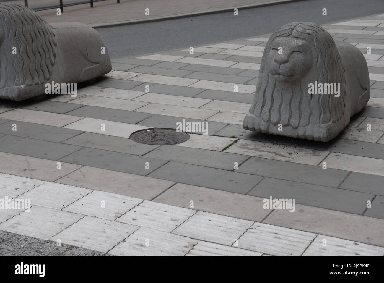 Concrete lions used as roadblocks in the center of Stockholm, Sweden Stock Photo