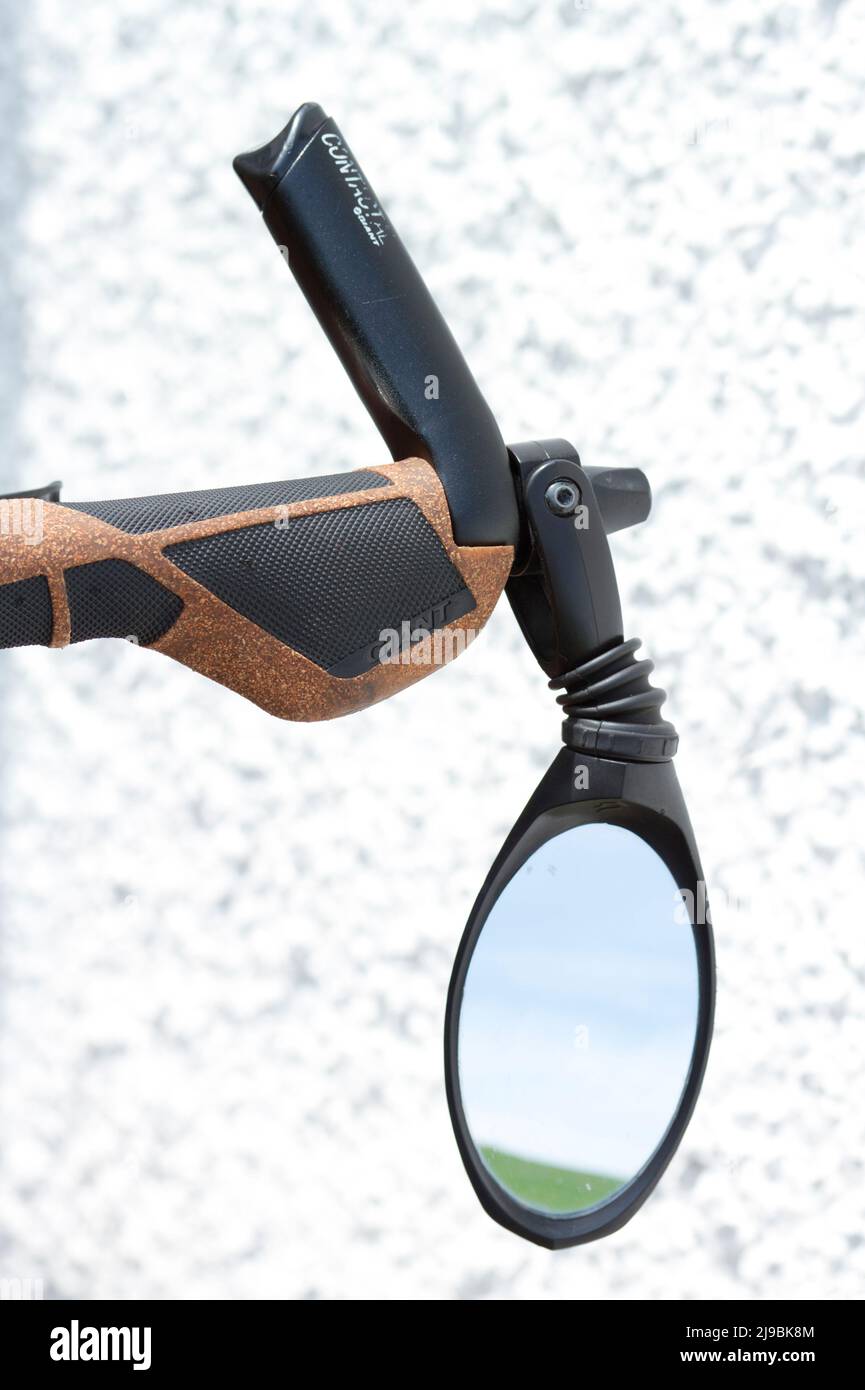 Mirror, bar ends and grips on bike handlebar Stock Photo