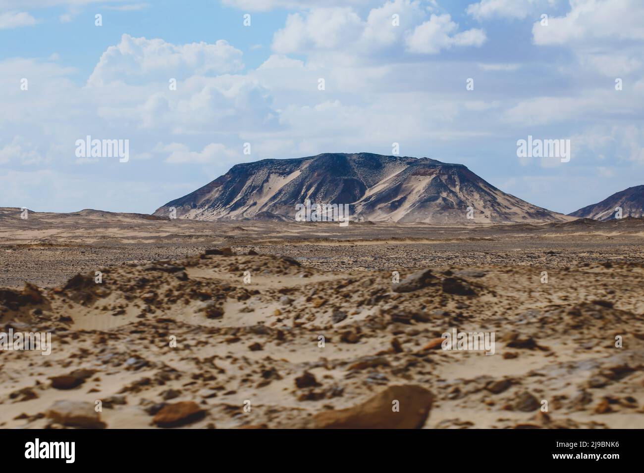 Panoramic View to the Sandy Hills in the Black Desert, is National park in the Farafra Oasis, Egypt Stock Photo